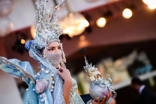 A guest arrives for the opening ceremony.jpg